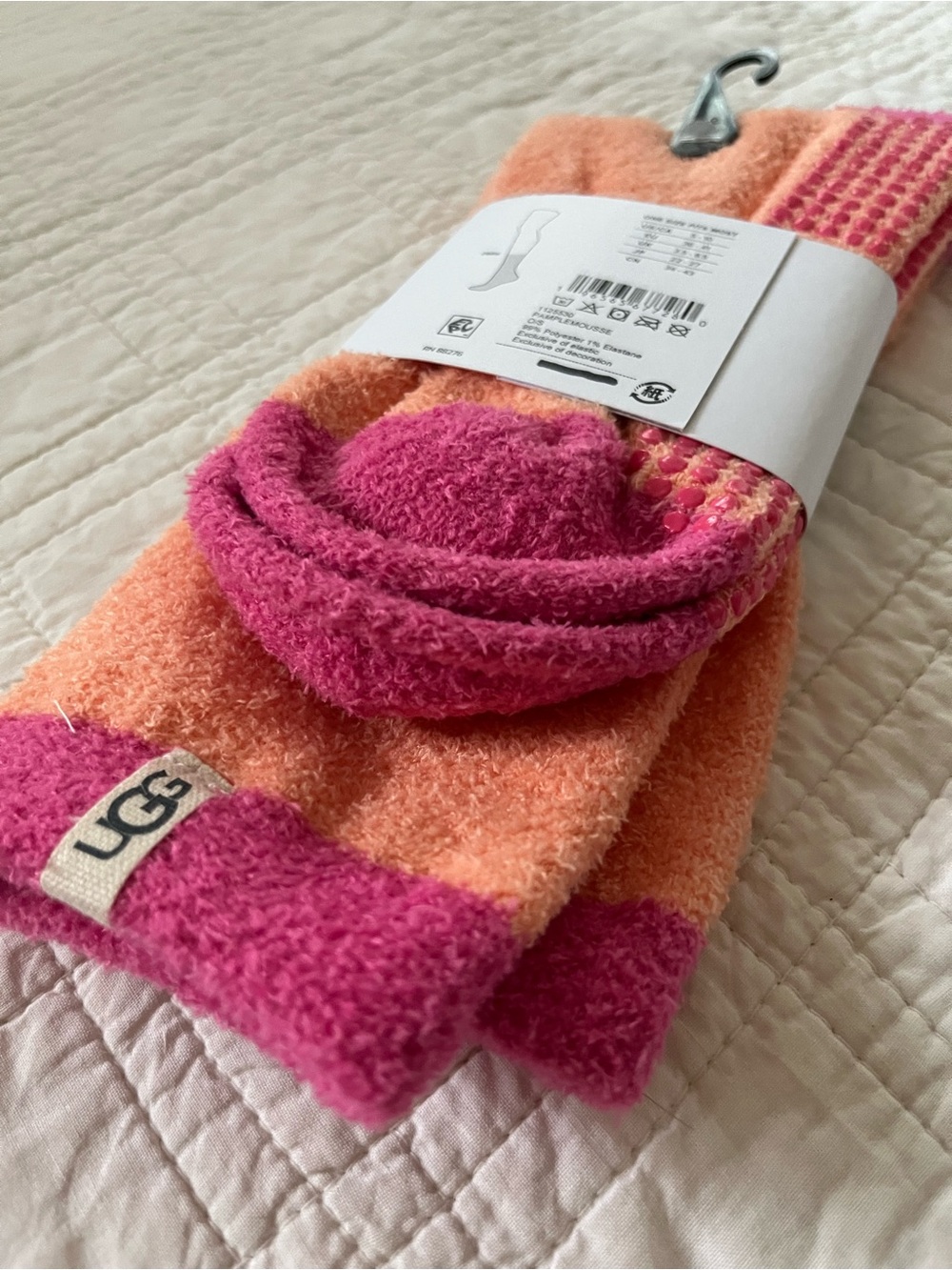 UGG Women's Fuzzy Cree Socks in Peach and Magenta with grips